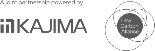 Greyscale logos of Kajima and the Low Carbon Alliance